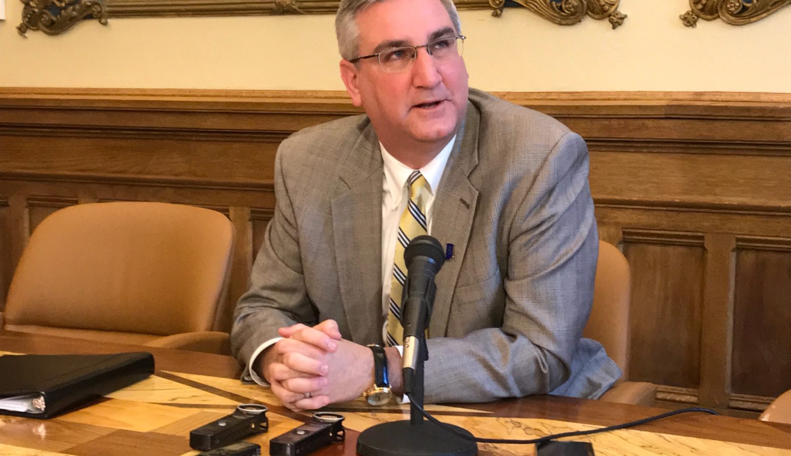 Governor Eric Holcomb discusses his pardon of Keith Cooper. (Brandon Smith/IPB News)