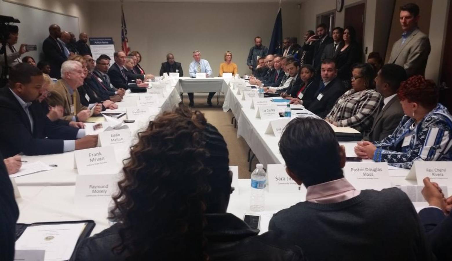 Gov. Eric Holcomb listens to residents and community leaders address some of their concerns with the lead contamination in East Chicago, Indiana. (Lauren Chapman/IPB News)