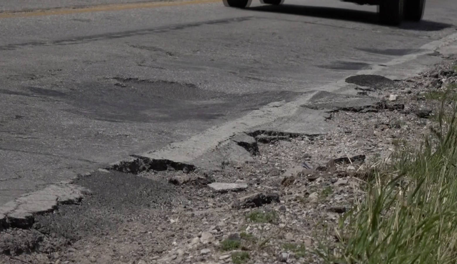 On County Road 200 in Avon has some significant damage between Dan Jones Road and Ronald Reagan Parkway. (Lauren Chapman/IPB News)