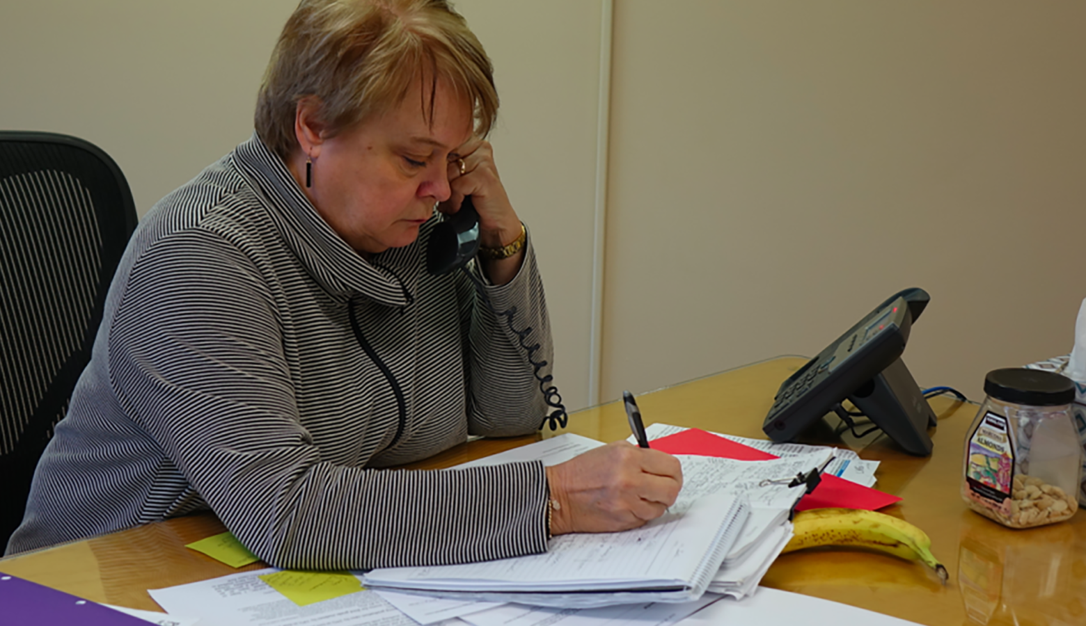 Peggy Hinckley is the state-hired emergency manager for the Gary Community School Corporation. The former Indiana superintendent and Lake County native sits at her desk in the district's main office. (Eric Weddle/WFYI News)