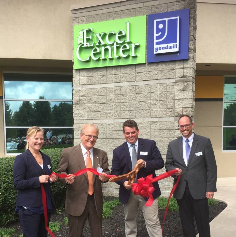 Muncie and Excel Center officials cut a ceremonial ribbon.