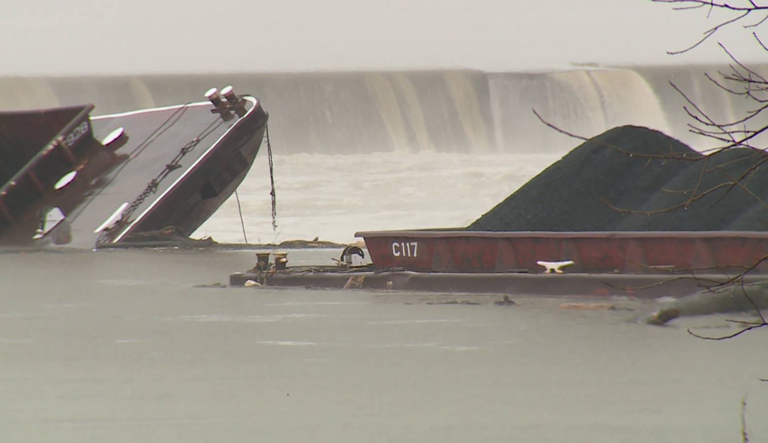 Two barges near the McAlpine Lock and Dam, close to Indiana's Falls of the Ohio State Park in southern Indiana (Steve Burns/WTIU)