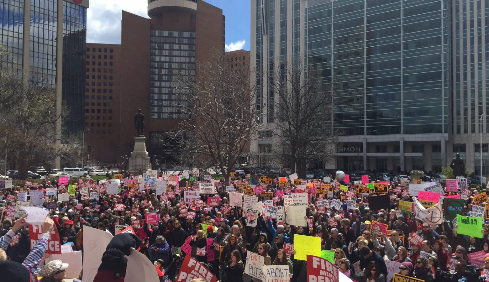 People rally outside the Statehouse in 2016 over an Indiana anti-abortion law. (FILE PHOTO: Brandon Smith/IPB News)