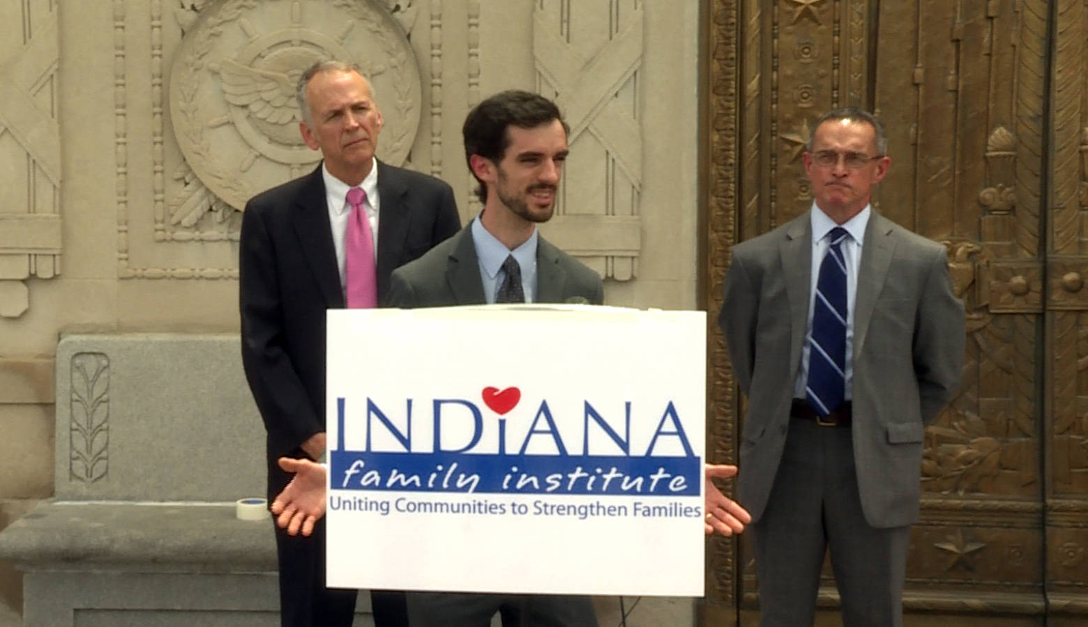 Former Brownsburg teacher John Kluge, joined by his lawyers, speaks to the press announcing the lawsuit Wednesday. (Jeanie Lindsay/IPB News)