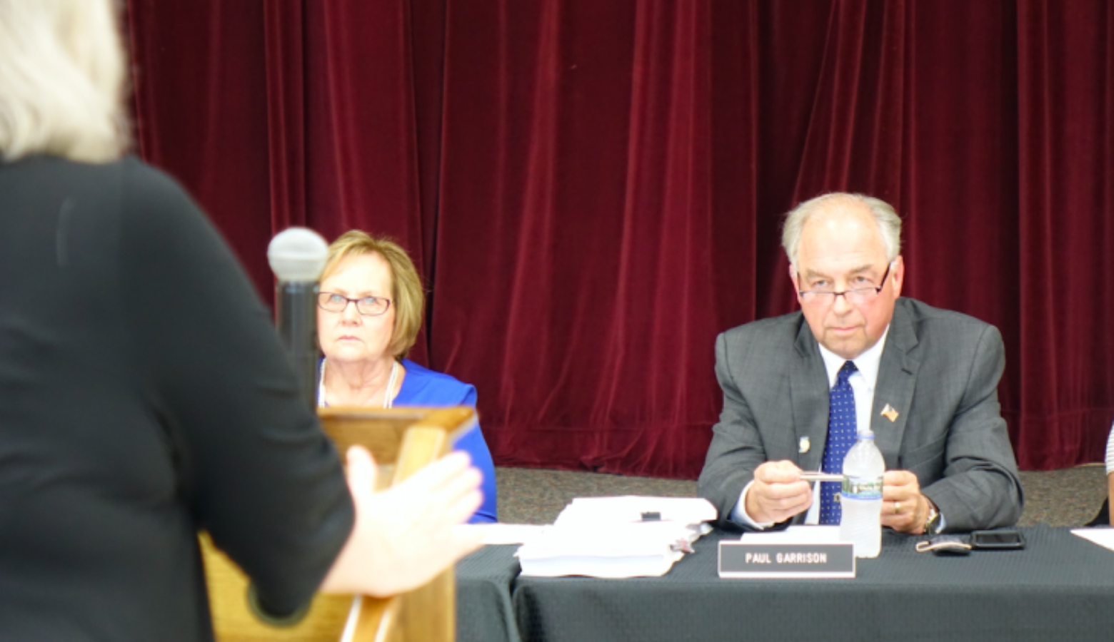 Daleville Community School's Board President Diane Evans, left, and Superintendent Paul Garrison listen to Indiana Virtual School attorney Mary Jane Lapointe during a meeting Monday, Aug. 19, 2019 at the Daleville high school.