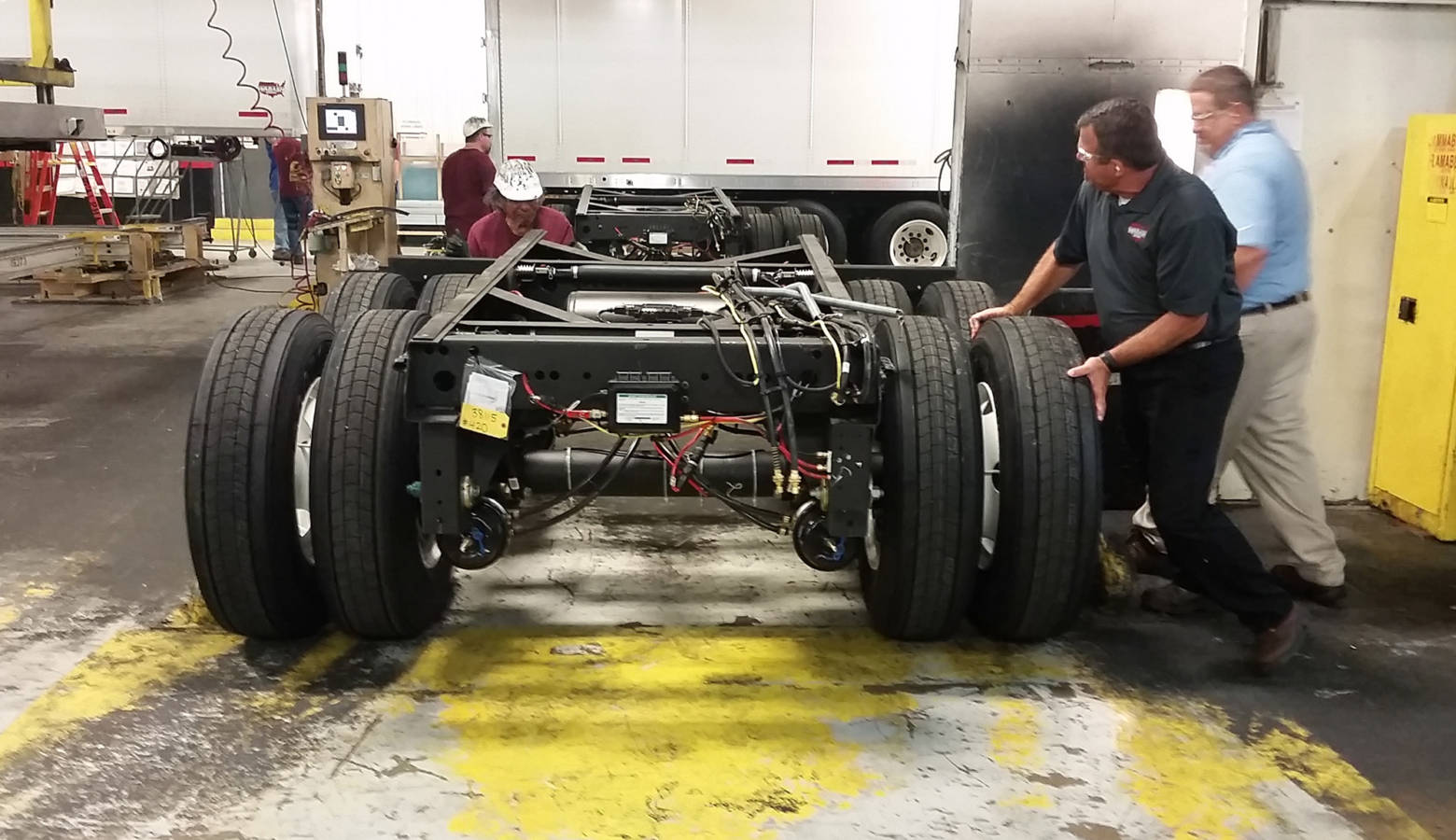 Workers assemble truck trailers at Wabash National's Lafayette factory. (FILE PHOTO: Annie Ropeik/IPB News)