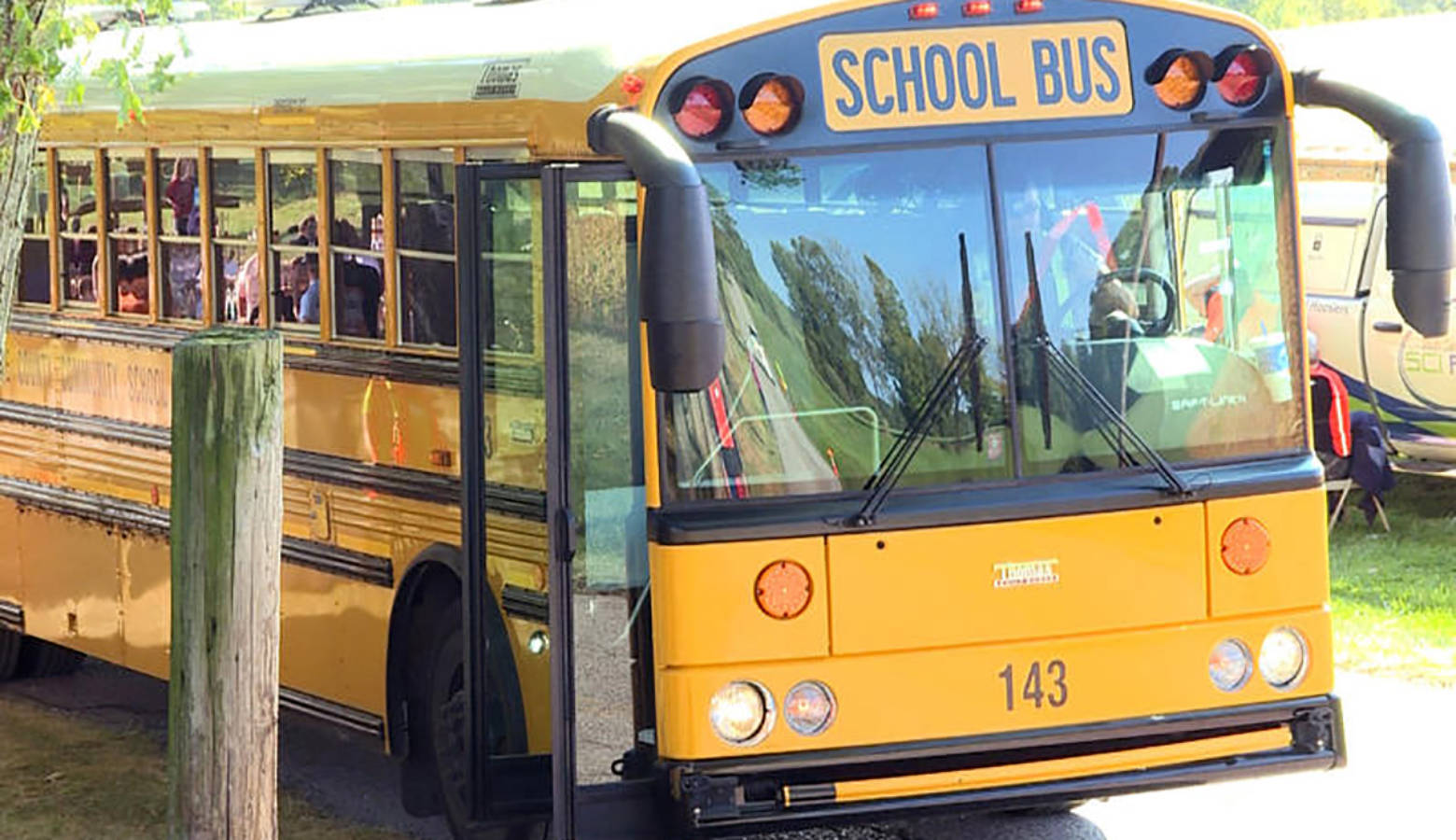 A law that went into effect earlier this year makes says drivers caught illegally passing stopped school buses can face penalties including fines of up to $5,000 or have their license suspended for up to a year. (Jeanie Lindsay/IPB News)