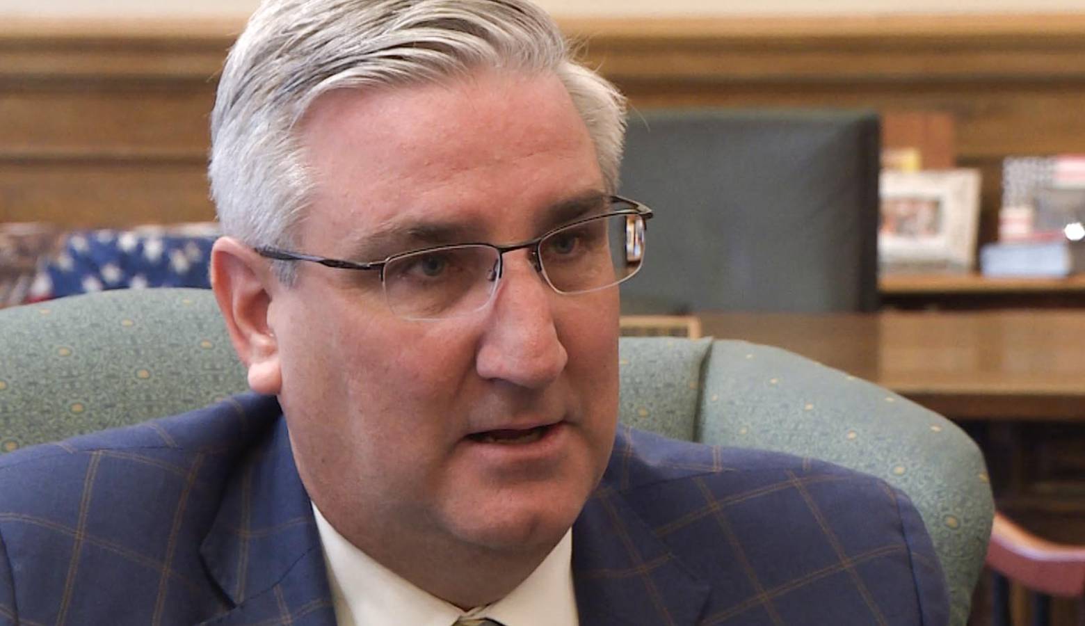 Gov. Eric Holcomb says he wants to know more about the ways school money gets to teachers’ salaries before adding even more dollars to the mix. (Zach Herndon/WTIU)