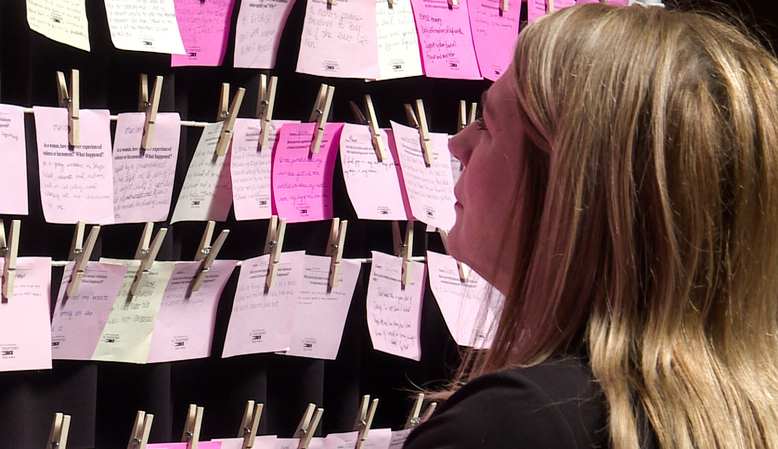 Rep. Melanie Wright (D-Yorktown) reads over some of the personal statements collected from Hoosiers about their experience with sexual assault. (Lauren Chapman/IPB News)
