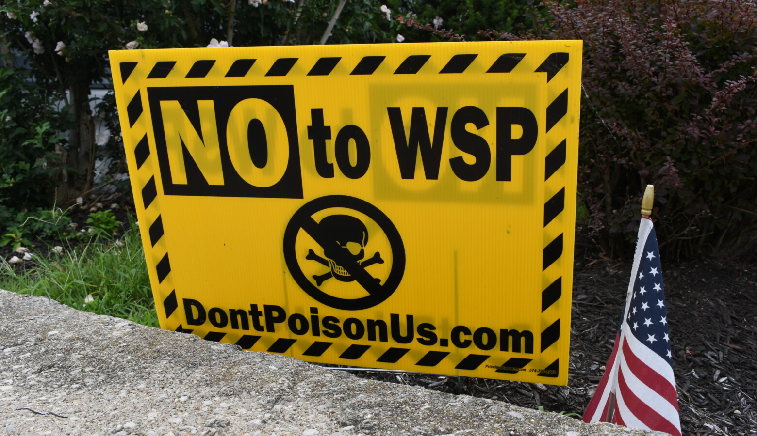 A yard sign in Logansport against the zinc oxide manufacturing plant, owned by Waelz Sustainable Products. (Justin Hicks/IPB News)