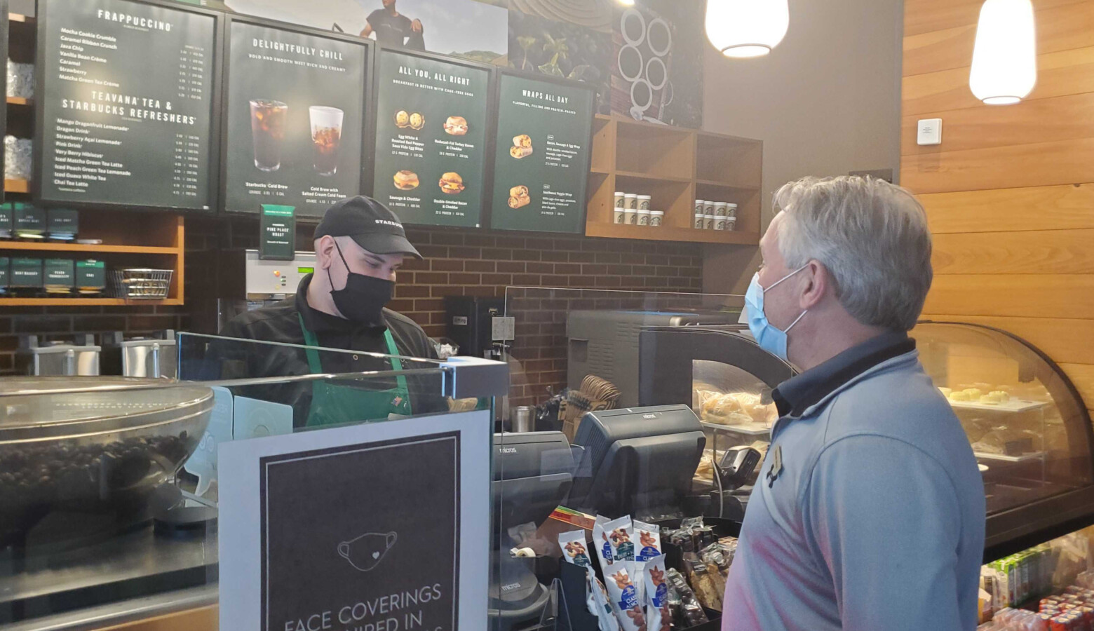 Indianapolis Marriott Downtown General Manager Michael Moros gets a coffee from the hotel's Starbucks. (Samantha Horton/IPB News)