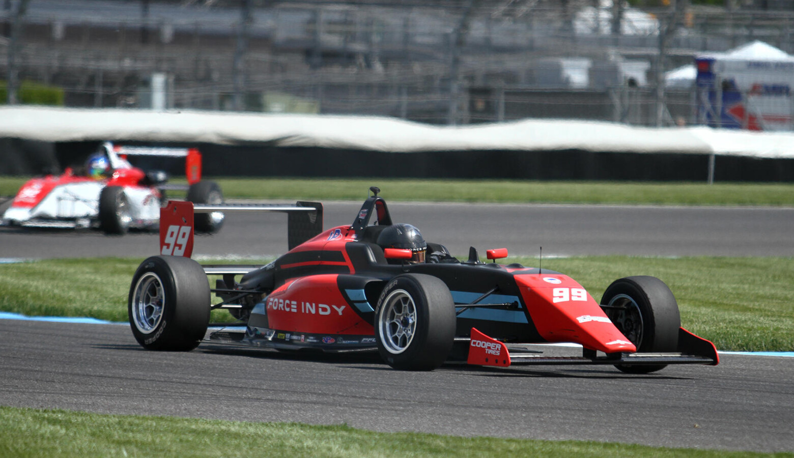 Force Indy driver Myles Rowe competes in the No. 99 car at the Indianapolis Motor Speedway. (Doug Jaggers/WFYI)