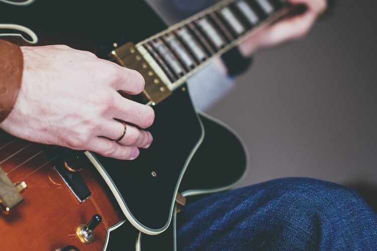 Man Playing Jazz Guitar