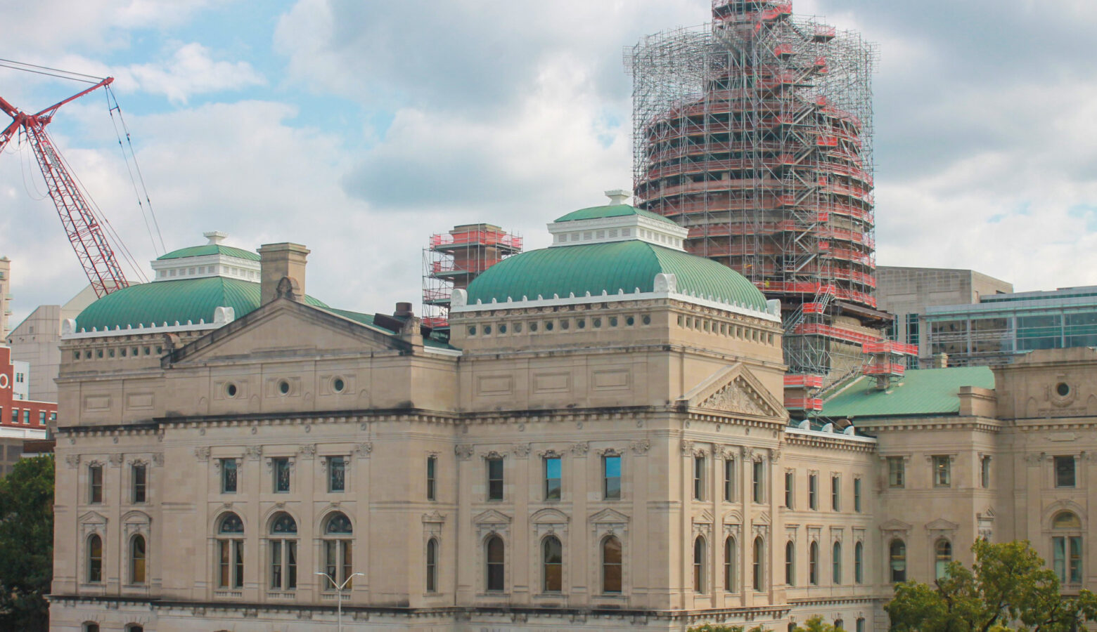 The Indiana Statehouse, as seen from its northwest side. There is scaffolding surrounding its dome.