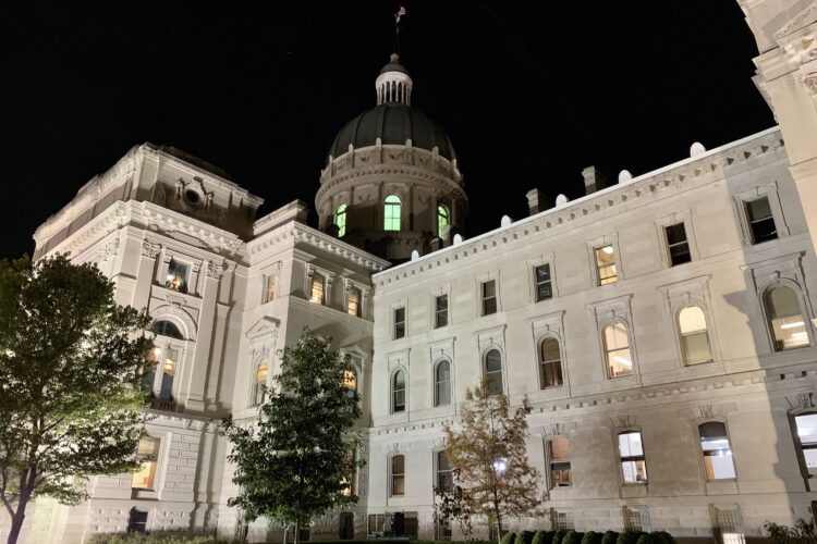 The Indiana Statehouse at night.