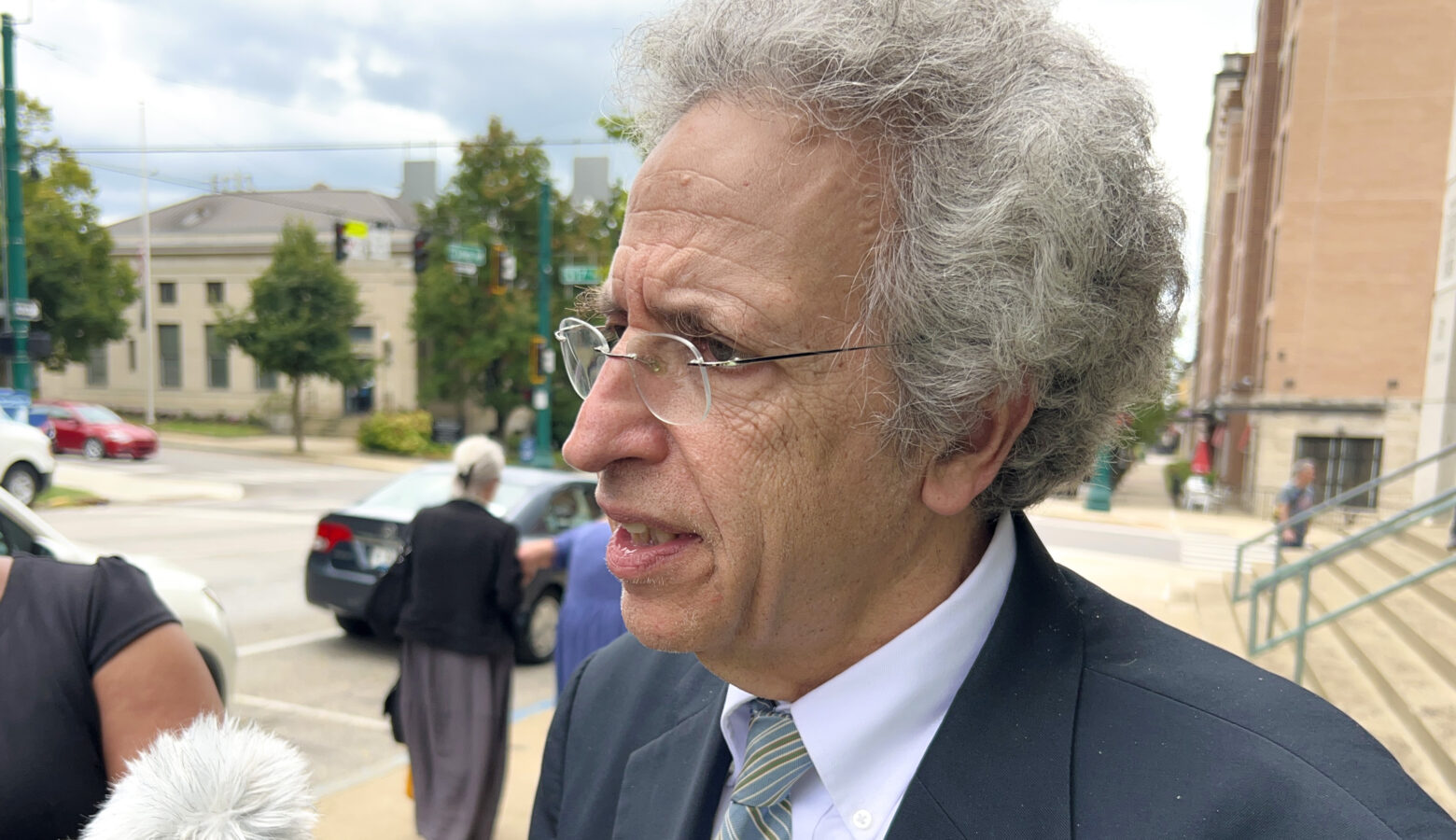 ACLU of Indiana's Legal Director Ken Falk speaks outside of a courthouse.