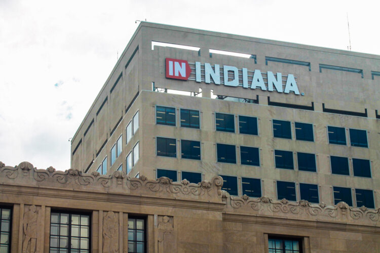 A state government building in downtown Indianapolis. Across the top of the building is a sign that reads "In Indiana."