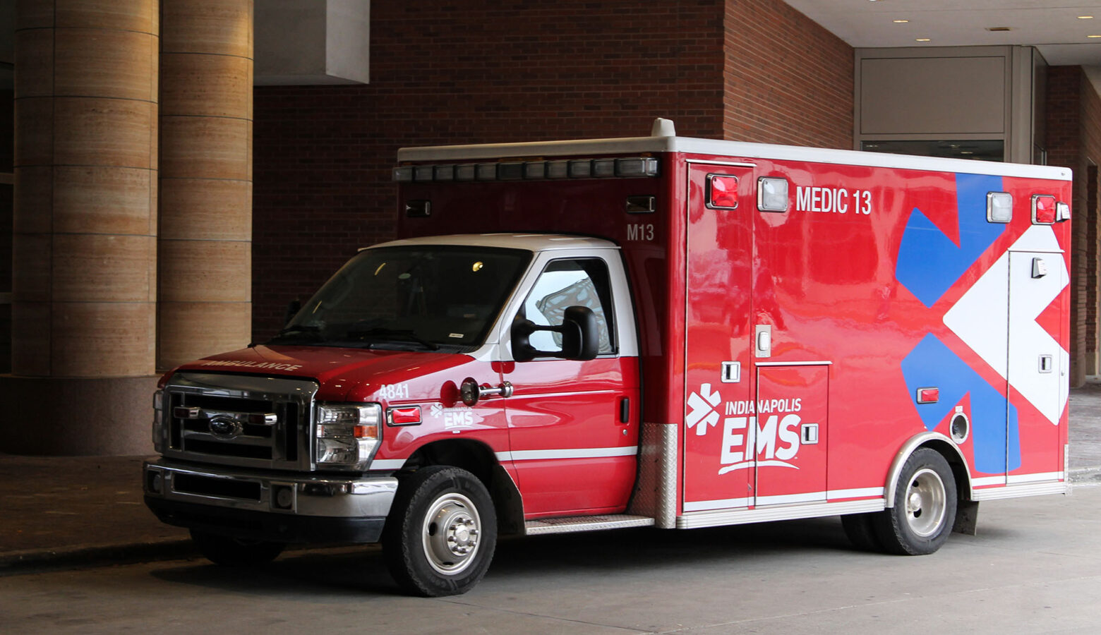 A red Indianapolis EMS unit outside of the Indianapolis convention center.