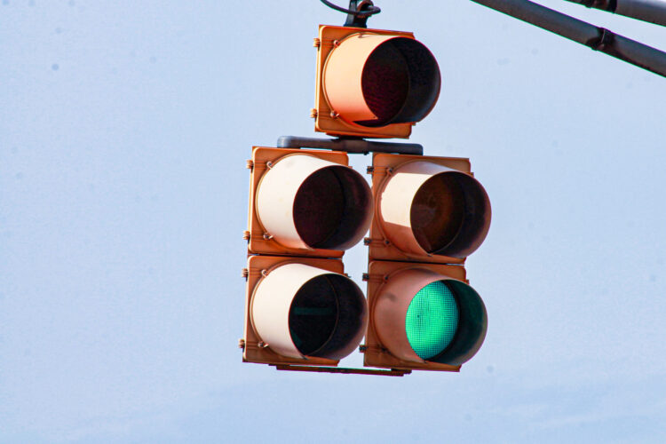 A stop light, with the green illuminated.