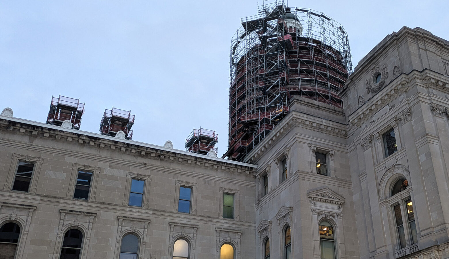 The Indiana Statehouse as seen from its western entrance in the evening.