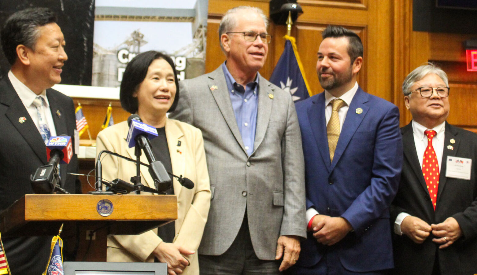 Gov. Mike Braun and Lt. Gov. Micah Beckwith pose with Taiwanese delegates.