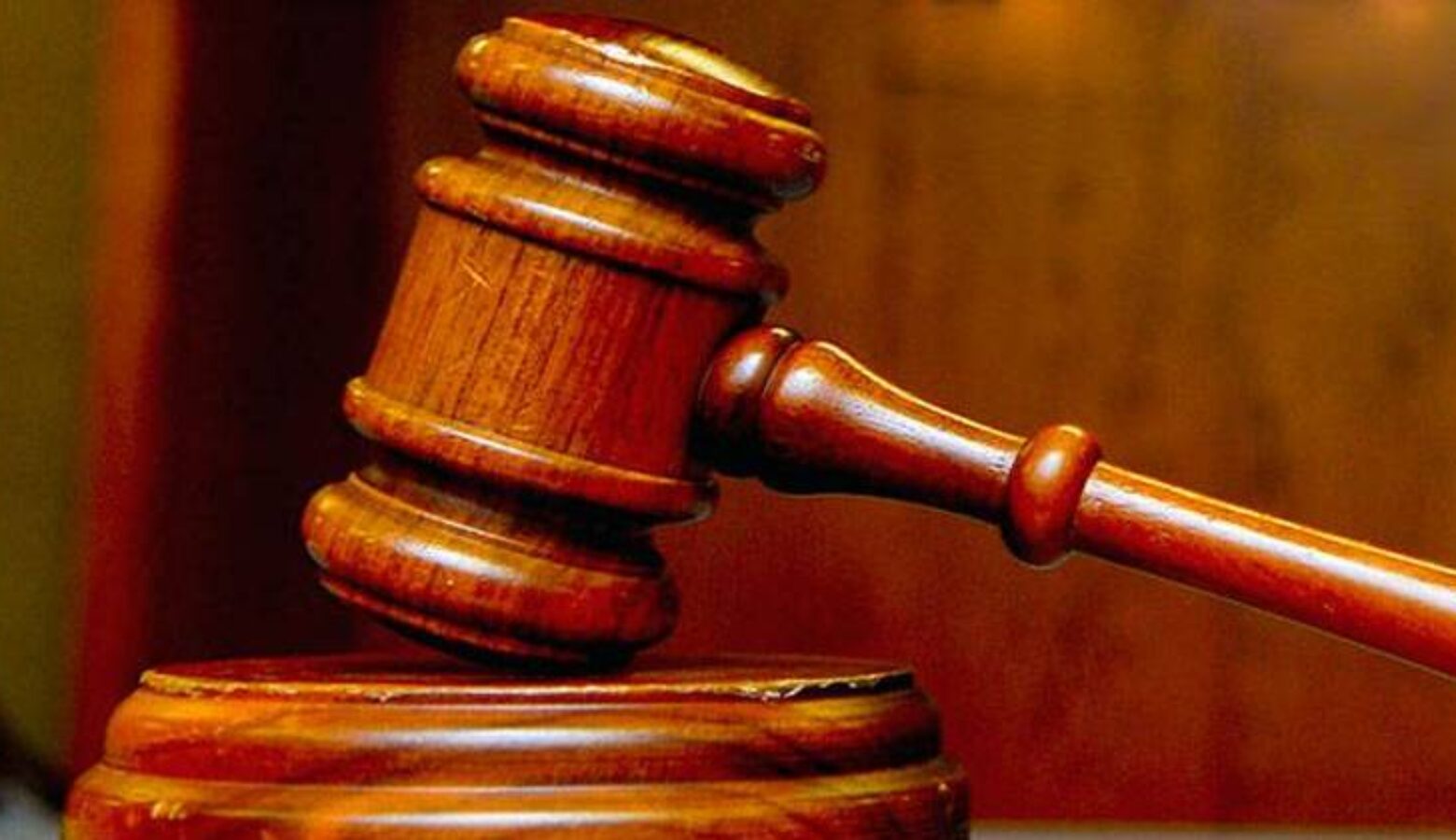 A closeup photo of a wooden gavel.