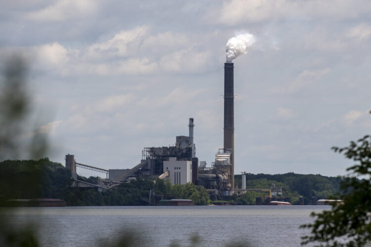 A coal plant can be seen across the bank of a river in Warrick County, Indiana.