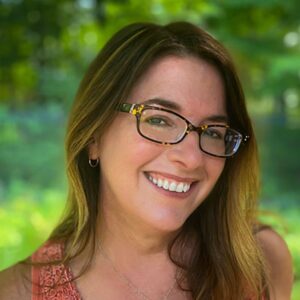 Jill Christman outdoors smiling.