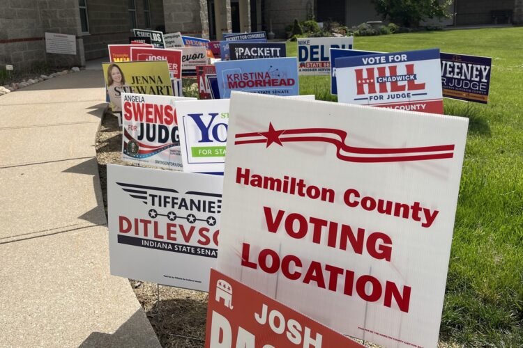 Signs outside an early voting location in Noblesville, Indiana.