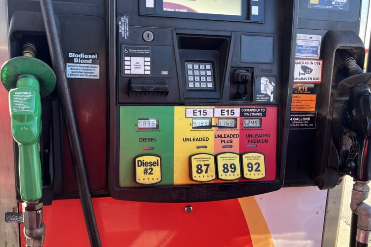 A gas pump shows gas prices that are more than $4 for unleaded and nearly $6 for diesel.
