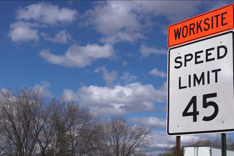 A speed limit sign reads Work Zone Speed Limit 45.