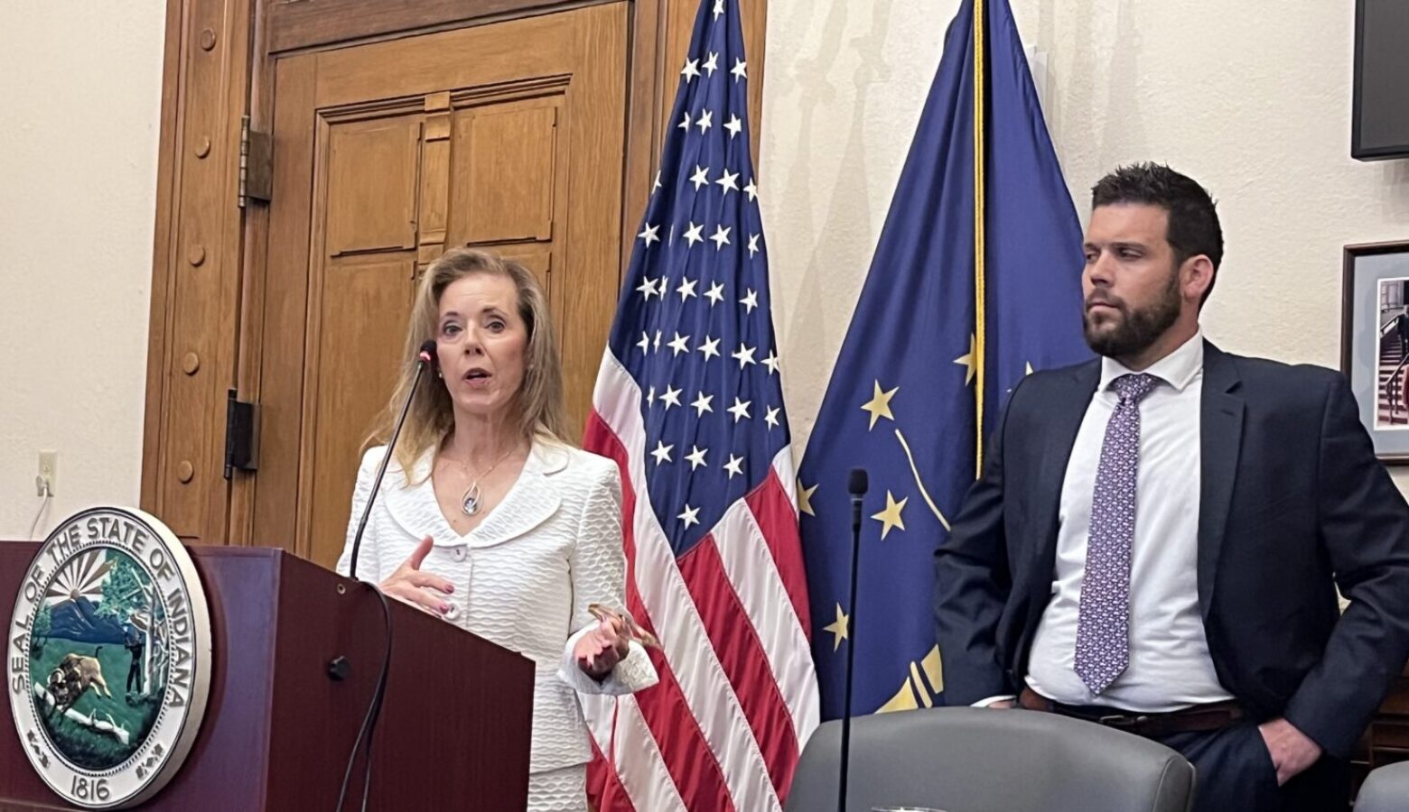 Indiana Secretary of Management and Budget Lisa Hershman speaks alongside State Budget Director Chad Ranney during a news conference.