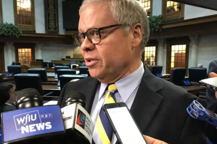 Republican Sen. Ron Alting (R-Lafayette) announced Wednesday he would resign from his office if reelected in November. Alting has served his district for nearly 30 years. He was photographed talking to reporters holding microphones in front of him in the Indiana Senate chamber.