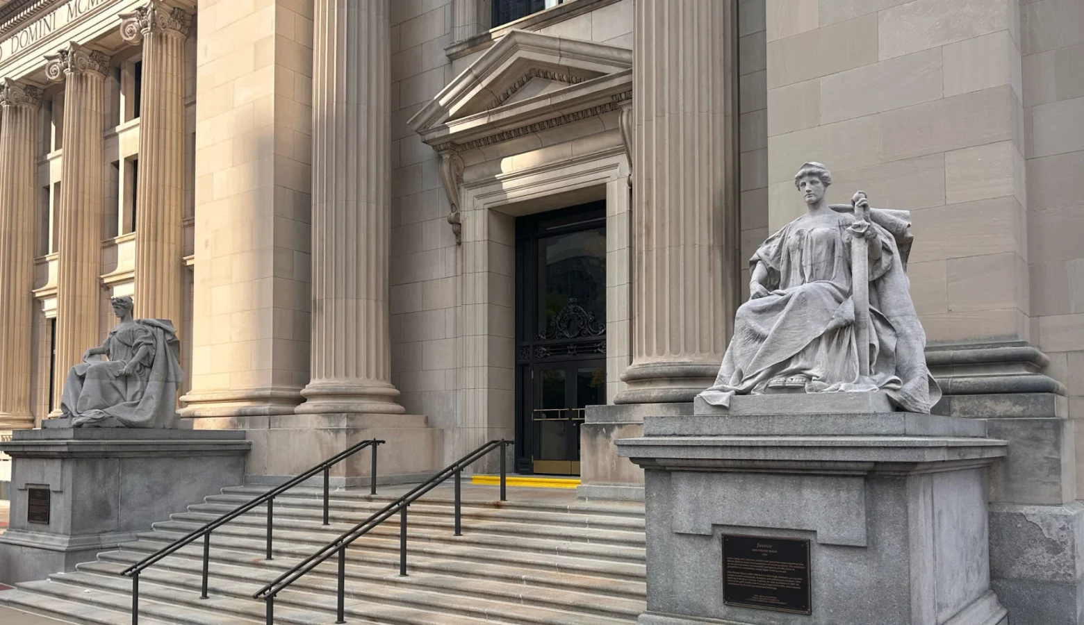 The U.S District Court for Southern Indiana is in the Birch Bayh Federal Building on East Ohio Street in downtown Indianapolis. The photo shows steps leading to a doorway situated between two statues.