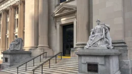 The U.S District Court for Southern Indiana is in the Birch Bayh Federal Building on East Ohio Street in downtown Indianapolis. The photo shows steps leading to a doorway situated between two statues.