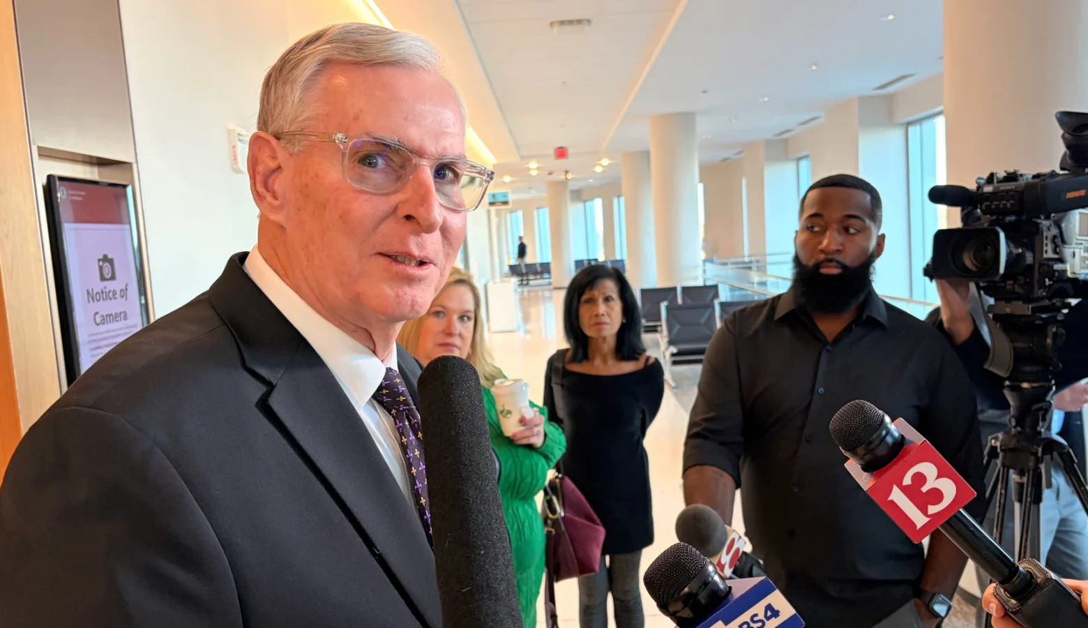 Greg Ballard speaks to reporters outside an Indianapolis courtroom.